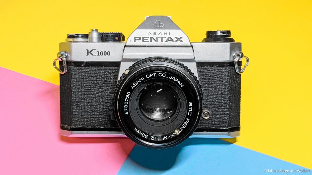 The Pentax K camera on a colourful background