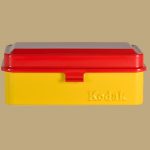 Kodak film case with a red top and yellow base.